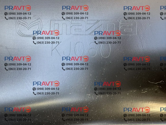 Губа (накладка) переднього бампера Mazda VA4050032, VA40-50-032